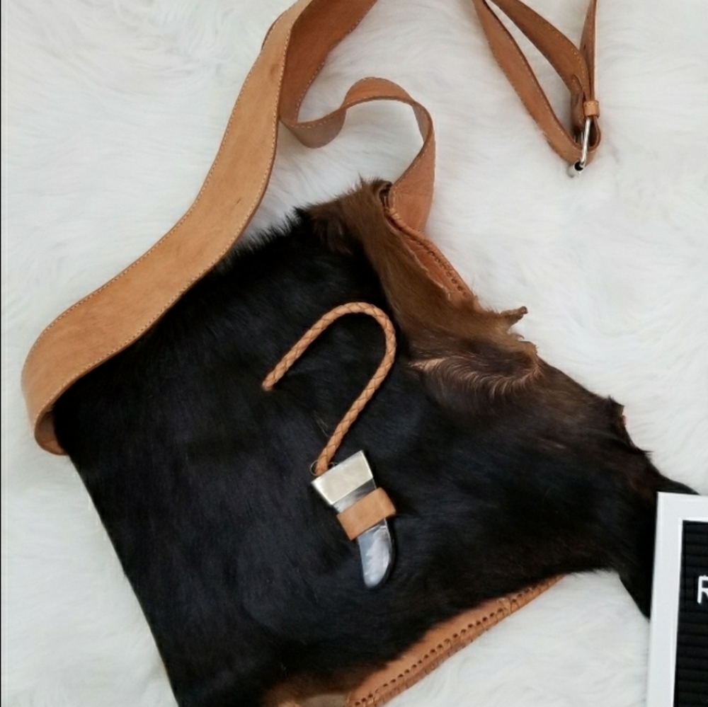 Beautiful cowhide western concert or festival bag